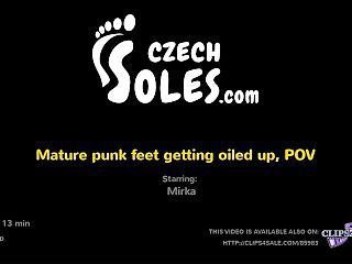 Mature punk feet getting oiled up, POV (mature feet, oily feet, punk feet, bare feet, close up toes)